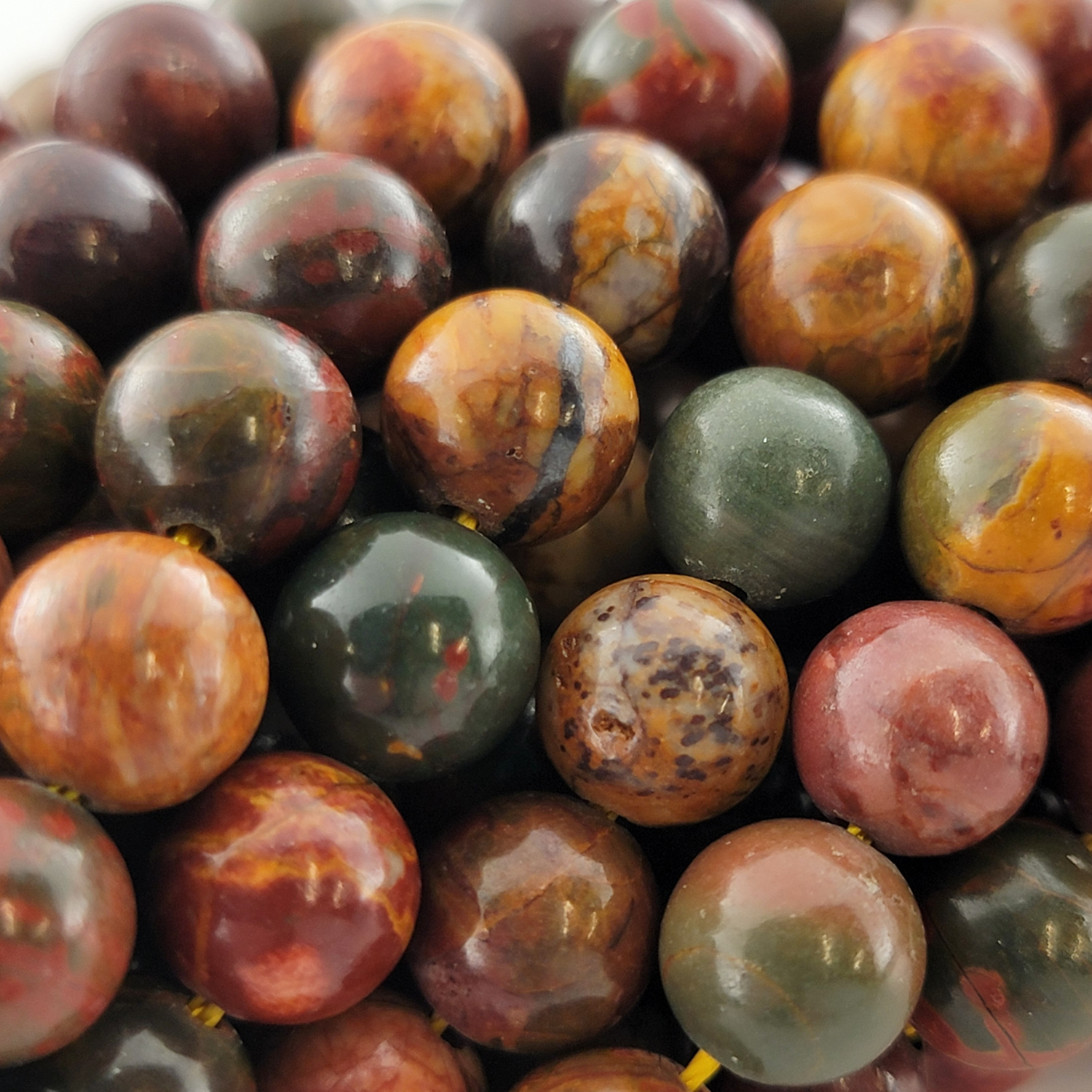 Red Creek Jasper Natural Smooth Round Beads