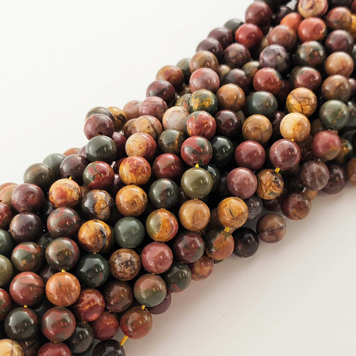Red Creek Jasper Natural Smooth Round Beads