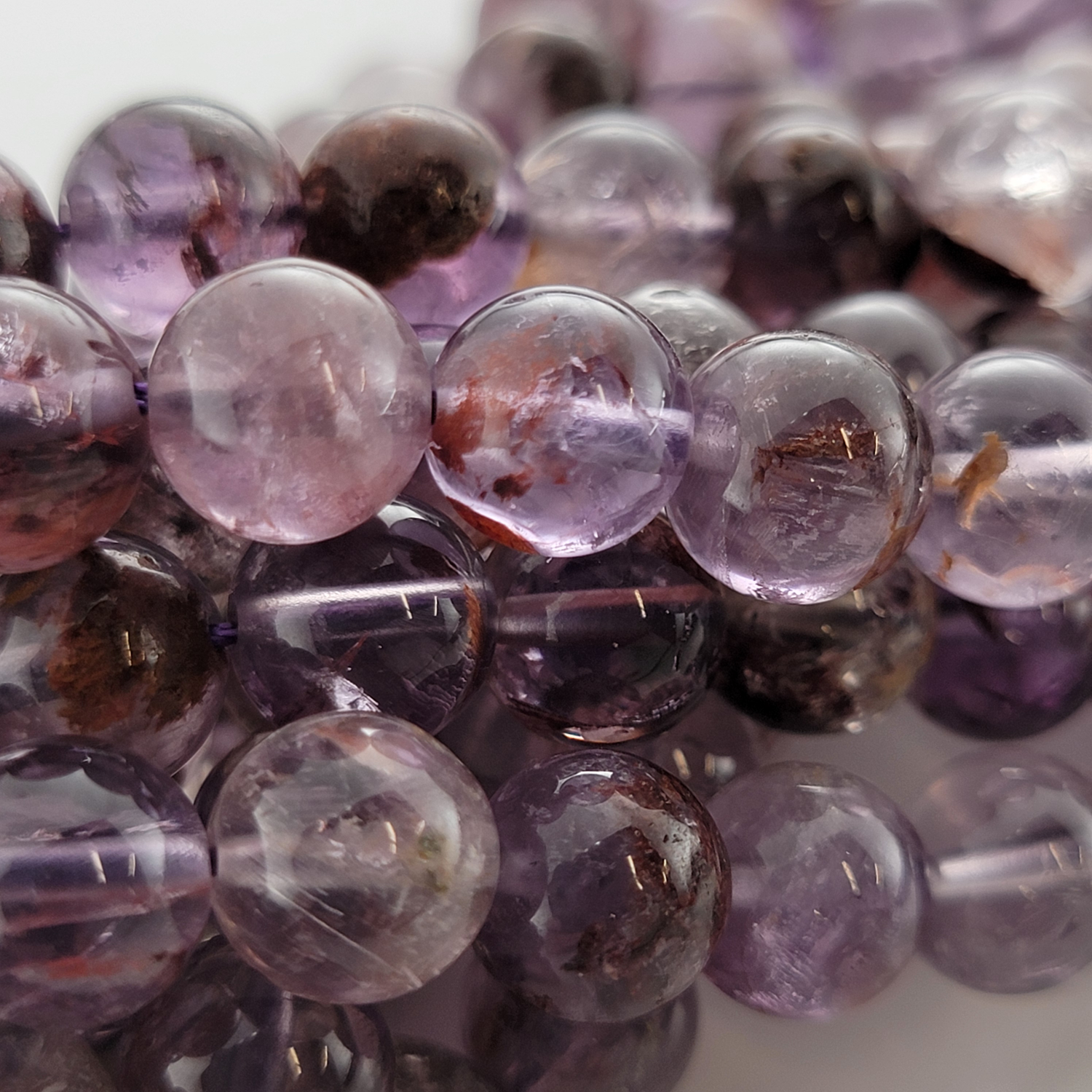 Super 7 Cacoxinite Purple Phantom Natural Smooth Round Beads